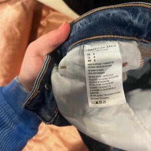 American eagle next level stretch distressed jean shorts.